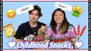 Trying out each other Childhood Snacks