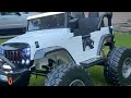 Lifted Monster Jeep 2 seater Voltz Toys -toddler meets her new toy