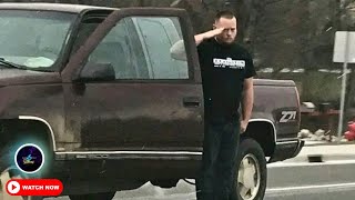 Man looks in rear-view, immediately pulls over and jumps out