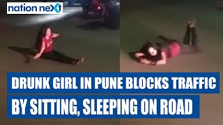 Drunk girl in Pune blocks traffic by sitting, sleeping on road