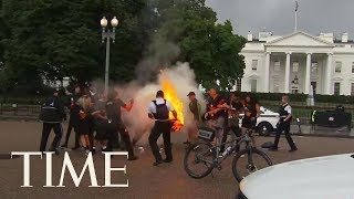 Protesters Burn American Flag Outside White House Ahead Of Trump Speech | TIME