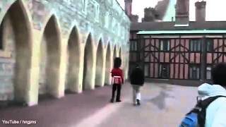 Dramatic moment Queen's Guard pulls rifle on tourist