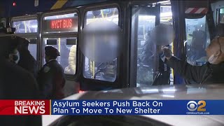Some migrants refuse to leave Midtown hotel for shelter in Brooklyn