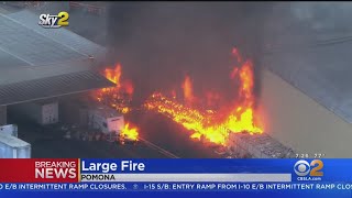 Large fire burns in Pomona warehouse