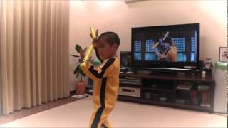 Little Kid Imitates Bruce Lee's Nunchaku Scene