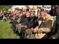 As veterans of the 29th Infantry Division continue their tour of small Normandy towns they liberated