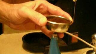 Using Vibration to distribute coffee in espresso portafilter