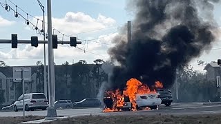 Car bursts into flames along Colonial Boulevard near the Diverging Diamond