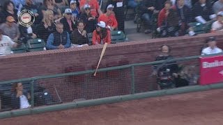 LAD@SF: Posey loses grip, bat gets stuck in netting