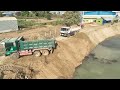 EP 68, Update Construction Resize Road on Canal by KOMATSU Dozer Push Soil Rock and Truck unloading