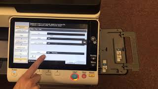 Adding a fax number to the address book on a Konica Minolta