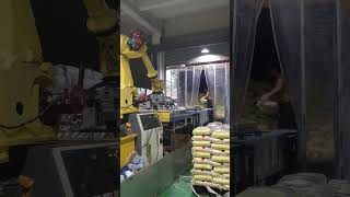 Robot use cases: Fanuc R-2000iB/200R robot using in rice bag palletizing work. #industrialrobot