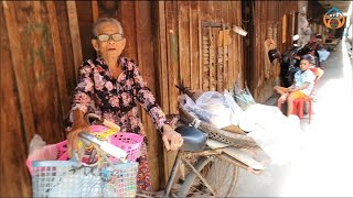 Khmer in the usa donate money to the poor/លោកយាយប៊ូ ឡេតមានវ័យចំណាស់បានទទួលថវិការខ្មែរអាមេរិក