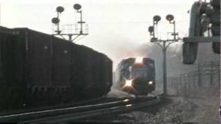 Conrail vantrain overtaking a Conrail freight train