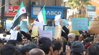 Syria security forces disperse rival protests in Damascus | AFP