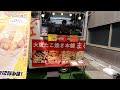 japanese street food truck. cooking made by a very cute woman