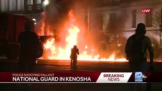 Protesters set city trucks on fire after Kenosha police shooting