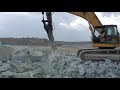 limestone breaking with rock breaker....