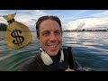 I found a bag of money metal detecting underwater!