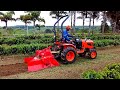 trator kubota b2320 com enxada rotativa.