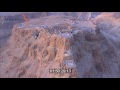 Aerial footage of Masada at sunrise, Judea desert, Israel