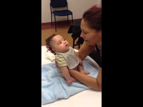 Cerebral palsy baby's expression and first smiles Cerebral palsy baby's expression and first smiles