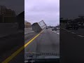 U-HAUL TRAILER FLIPS OVER