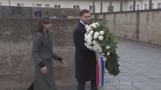 JD Vance lays a wreath at the Dauchau concentration camp in Germany