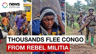 Thousands flee as rebels seize Congo city