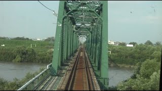 信濃川放水路を渡る越後線の寺泊駅～分水駅間を走行する115系