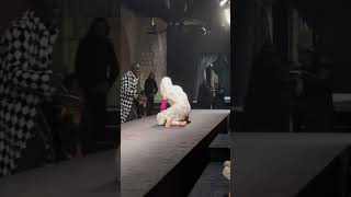 Doja Cat getting up to help the Model that fell at the Valentino Couture show in