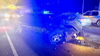 911 calls from crash involving NHCSO deputy reference car fire, woman in distress