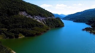 Zooming a Great Dam and Lake in the Carpathian Mountains - SIRIU