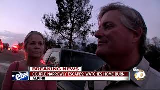 Couple narrowly escapes; watches home burn