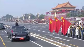 Chinese President Xi Jinping honors Party, national and military flags