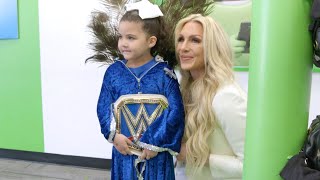 Flair shares a special moment with a young fan: Charlotte Flair A&E Biography: Legends sneak peek