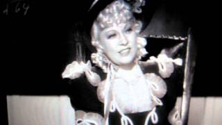 Mae West teaches a room of school boys in \