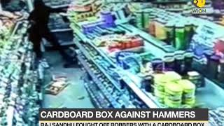 Shop owner's brave act caught in CCTV camera