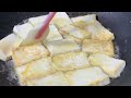 this is the delicious way to make home fried tofu. it is tender smooth and fragrant and crispy on