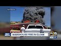 warehouse catches fire in globe