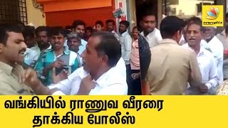 Ex-serviceman slapped by policeman outside bank | Latest Tamil News