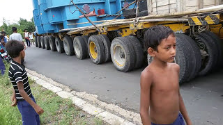 Heavy Equipment On Indian Road - Volvo FM12 Pulling Heavy 124 Wheeler Truck - Volvo Trucks.