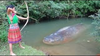 Primitive technology : Hot Girl catch fish at river and cooking fish eating delicious