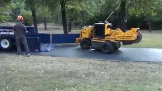 Air-tow trailer and Carlton SP7015 stump grinder