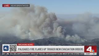 Helicopters attack Palisades Fire with water drops