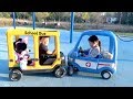 Riding School Bus and Ambulance Ride On Cars at the Playground