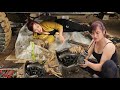 Genius girl repairs and restores car wheels.