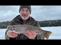 ice fishing for brook trout in haliburton forest canada