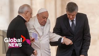 Pope Francis struggles to climb steps before weekly Vatican City audience