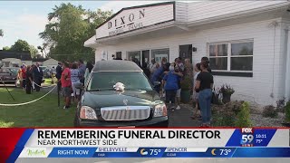 Community remembers funeral director robbed and killed outside his business
